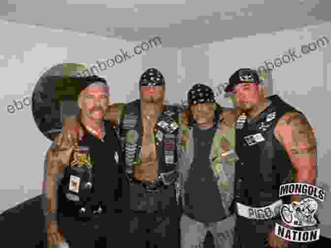 A Group Of Bikers Posing For A Photo, Their Faces Covered With Bandanas And Their Vests Adorned With Patches. Break A Leg: Reckless Omens MC 3